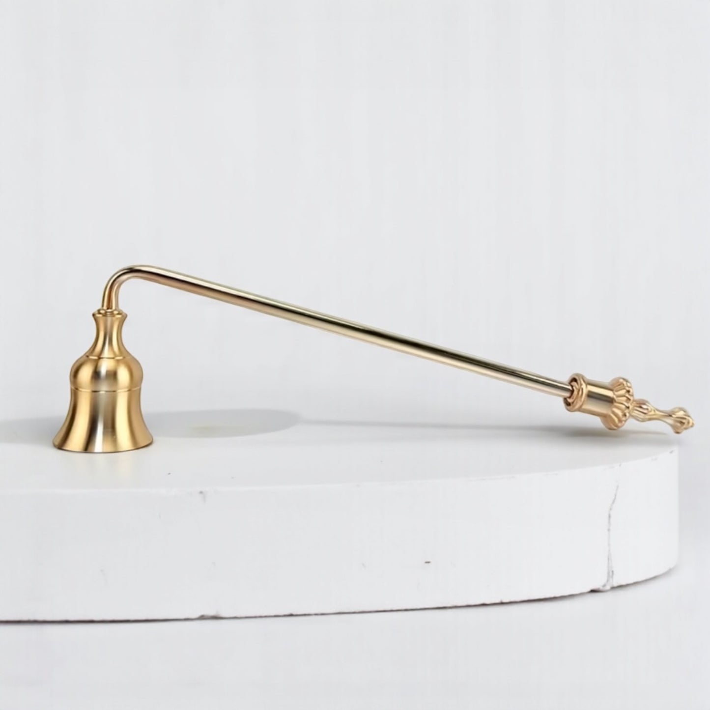 Elegant ljussläckare i guld
